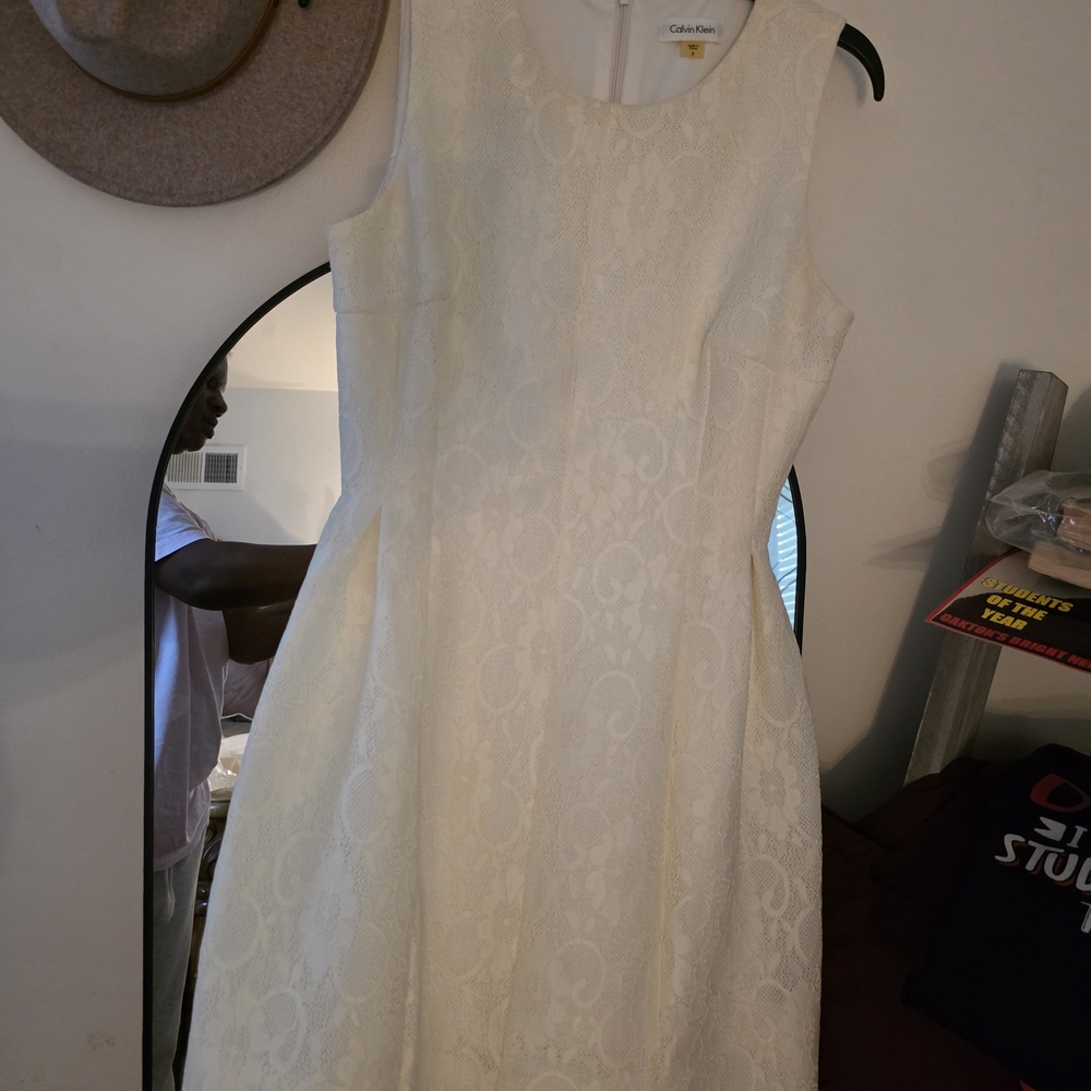 PrelovedCalvin Klein Cream Lace Wedding Dress bundle. Buy 2 Dresses Get 3 FREE.